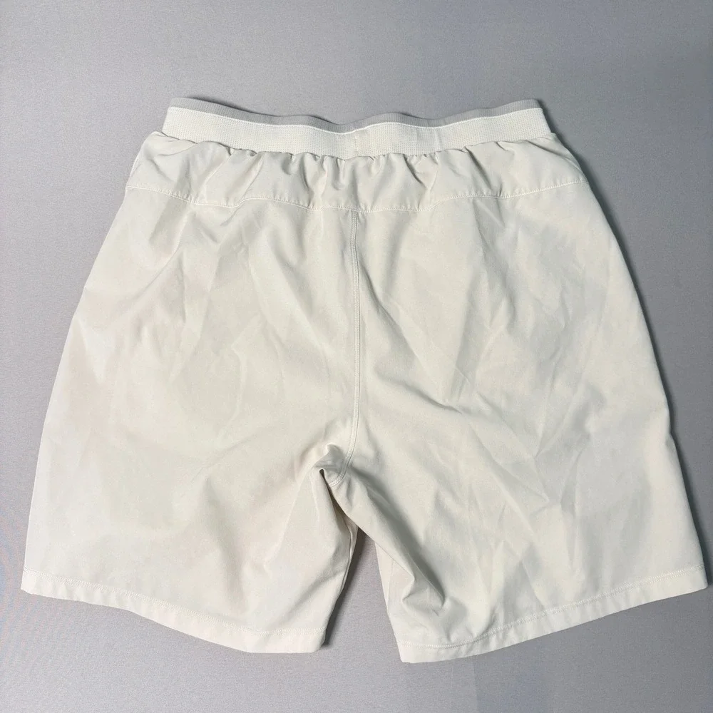 Fabletics Mens Active Training Shorts Off White Elastic Waist Pockets Size M 7in